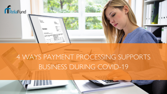 Woman at home office processing invoices, COVID-19
